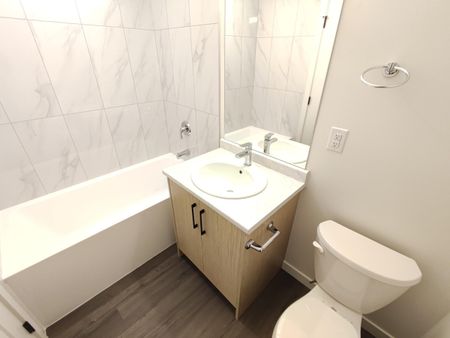 Central48 Unit 312/Spacious 2 Bedrooms, 2 Bathrooms PLUS Den - Photo 2