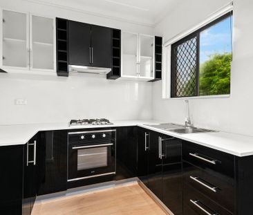 Renovated One-Bedroom Apartment by the Beach - Photo 1