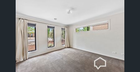 Four-Bedroom Home with Open Living and Double Garage - Photo 5