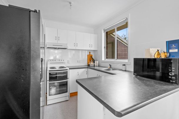 Neat and Comfortable Home - Photo 1