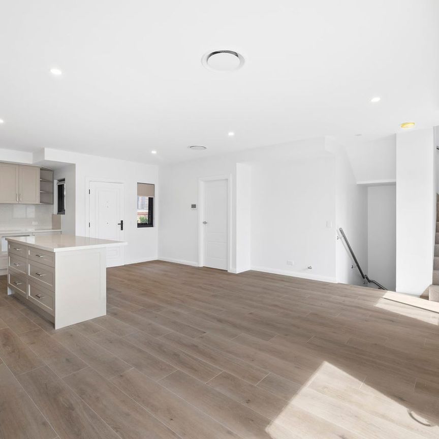 Impressive Brand New 3-Bedroom Townhouse - Photo 1