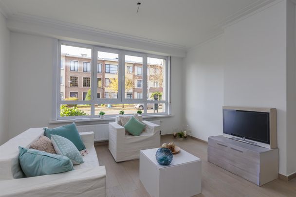 Gerenoveerd gelijkvloers appartement met 2 slpks en tuin - Foto 1