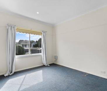 Charming Family Home with Spacious Living & Flexible Short-Term Lea... - Photo 1