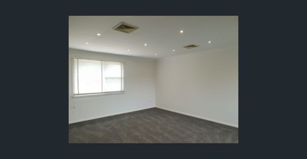 PICTURE PERFECT & TAILOR MADE FOR FAMILY LIVING IN A BOUTIQUE SETTING CLOSE TO ALL AMENITIES - Photo 1