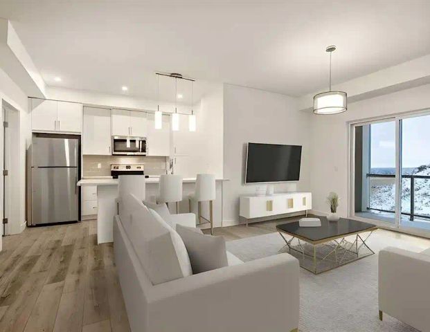1 Bed + Den Townhome | Attached Garage + Titled Parking Stall — 1 Bedroom+ Den Townhouse - Photo 1