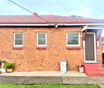 Stylish Coastal One-Bedroom Unit - Photo 1
