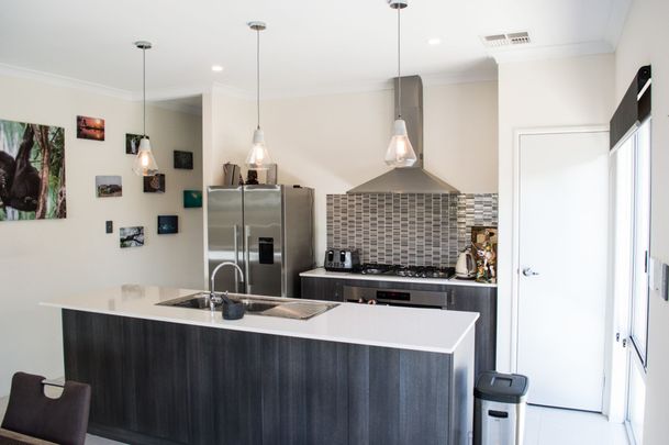 Stylish 3x2 Home with Spa & Entertainer's Patio in Alkimos - Photo 1
