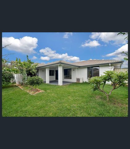 Spacious Four-Bedroom Family Home in Prime Middle Ridge Location - Photo 5