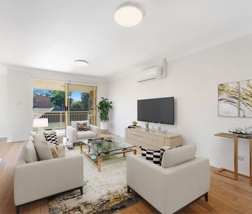 Warm and inviting top floor apartment sure to make you feel right a... - Photo 1