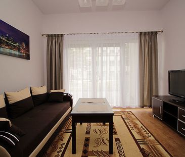 Kawalerka z ogródkiem na nowym osiedlu. - Фото 2