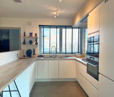 Halfopen woning met 3 slaapkamers, tuin en garage. - Photo 3