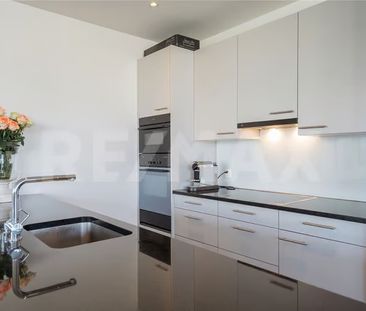 Moderne 2.5-Zimmer-Wohnung mit Balkon und Stadtblick in Schlieren - Photo 4