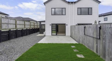 Modern 4-Bedroom in Prime Rototuna Location - Photo 4
