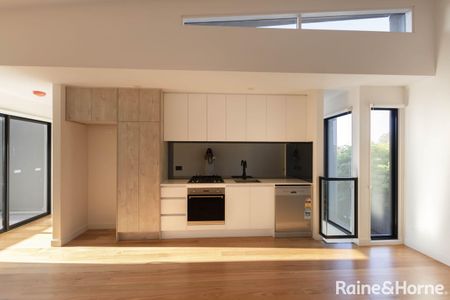 NEWLY BUILT! ARCHITECTURAL TOWNHOUSE IN BRUNSWICK AWAITS YOU - Photo 2