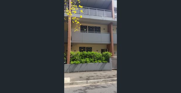 Split-Level Apartment - Resort-Style Living - Photo 1