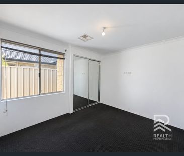 Modern 3-Bedroom Home with Theatre Room in Cannington - Photo 4