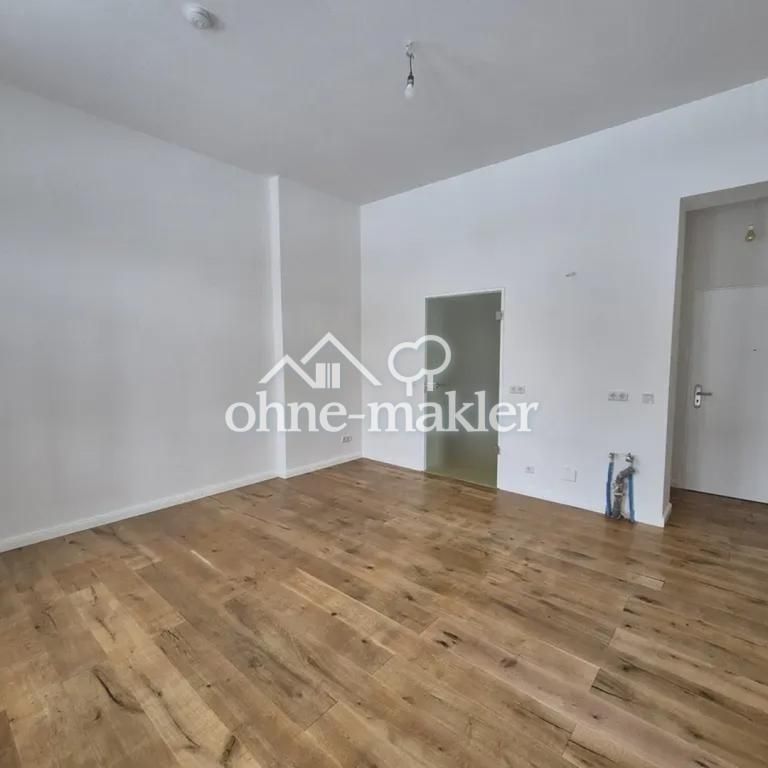 Helle 1-Zimmer-Wohnung mit Holzboden & Südbalkon in zentraler Lage - Foto 1