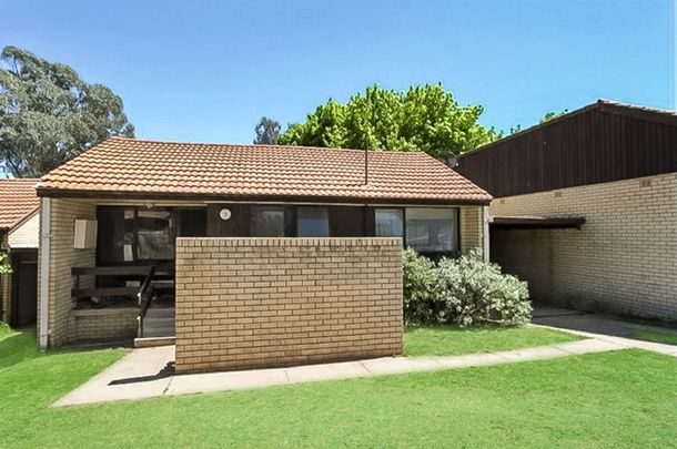 Affordable, No-Fuss Living Close to Town - Photo 1