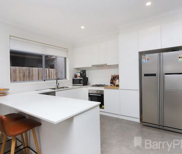 Setting the standard in low maintenance living - Photo 6