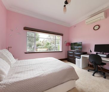 Charming Family Home in the McKinnon School Zone - Photo 5