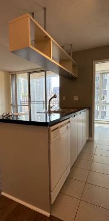 Beautiful One Bed & Den High Rise Apartment in Downtown Vancouver - Photo 1