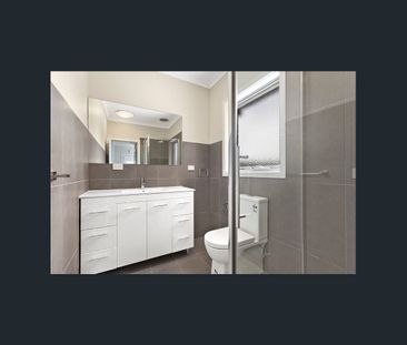 This townhouse is an easy 750 m walk to Reservoir Village - Photo 1