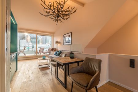 City-Residence: Tolle Penthouse-Wohnung mit Skylineblick und Dachterrasse - Photo 2