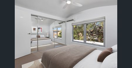 Two Floors, Two Carports, Too Good to Miss! - Photo 3