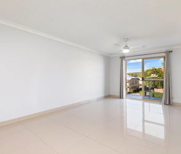 Inner-City Convenience with Spacious Living & Balcony Retreat - Photo 1