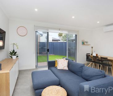 Setting the standard in low maintenance living - Photo 2