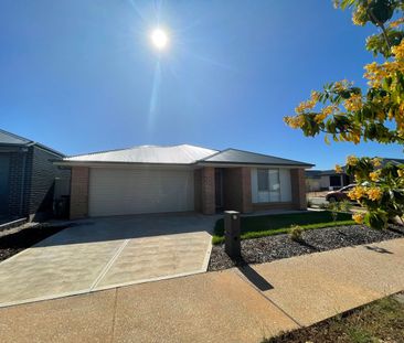 Modern 4 Bedroom Family Home - Photo 1