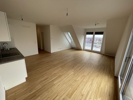 Zwei Dachterrassen, Kühlung & 2 Monate mietfrei: attraktive 3-Zimmer-DG-Wohnung - Foto 2