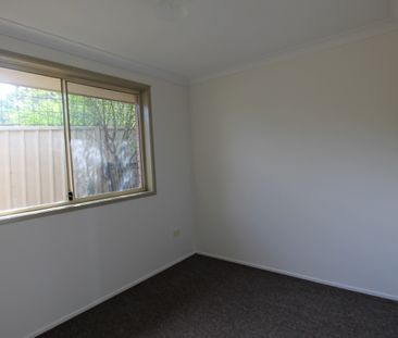 Two Bedroom Unit in Great Location - Photo 2