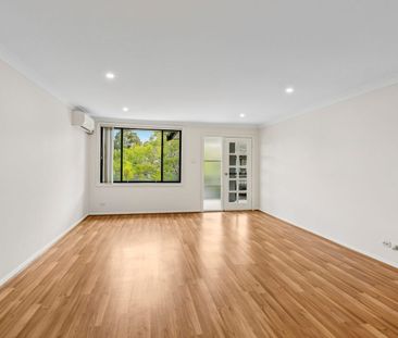 Spacious Three-Bedroom Apartment with Brand-New Kitchen and Bathroom! - Photo 1