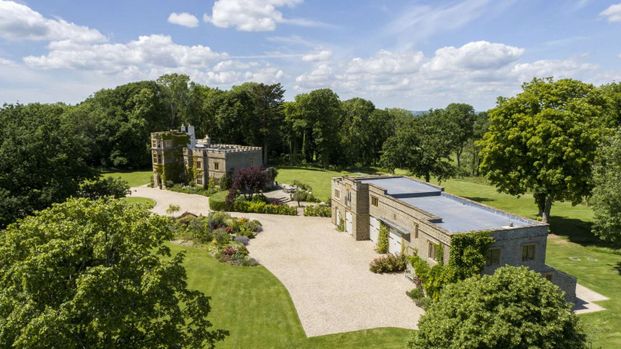 Beautifully refurbished family home of the highest quality, in an idyllic rural setting with far reaching views extensive secondary accommodation and about 14 acres. - Photo 1