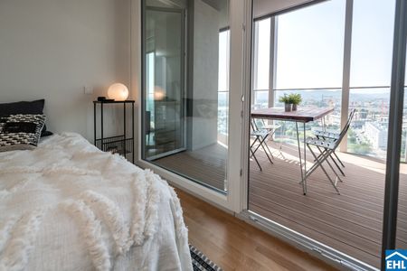 Urbanes Wohnen mit Rooftop Pool, Spa & Skylineblick – TOWER HOMES im V22 - Photo 4