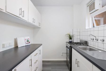 Spacious and sunlit in a sought-after street - Photo 2