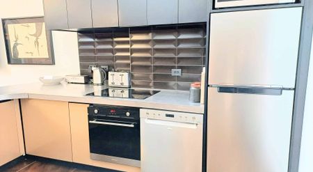 **2026 Heritage Meets Modern Luxury - Fully Furnished Apartment in the Empire Building** - Photo 4