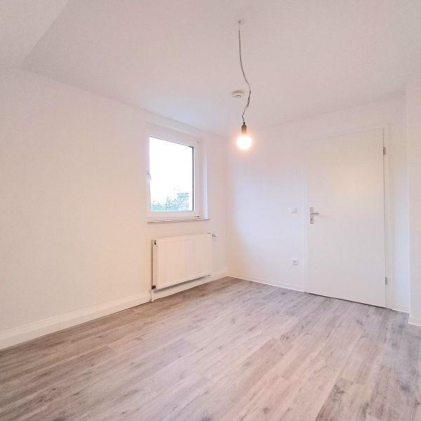 Dachgeschosswohnung in gepflegtem Wohnhaus - Photo 1