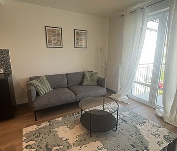 2-pokojowy apartament, balkon, miejsce parkingowe - Zdjęcie 1