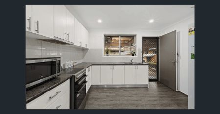 STUNNING FAMILY HOME WITH WITH IN-GROUND POOL - Photo 4