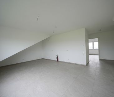 Hochwertige Dachgeschosswohnung in idealer Lage! - Photo 1