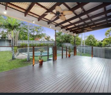 “Family Living with Pool & Entertaining Deck in Stafford Heights” - Photo 4