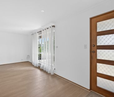 Open the door to coastal living - Photo 3