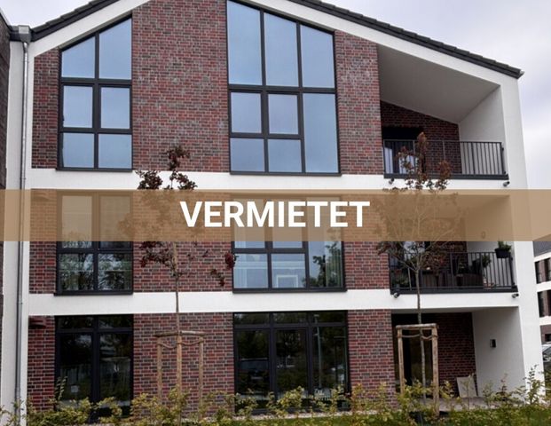 Wohnen am Norder Tief: Schöne Erdgeschosswohnung mit Blick auf die Mühle! ERSTBEZUG - Photo 1