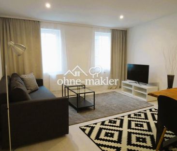 zentral, dennoch ruhig. Moderne und helle Wohnung mit Stellplatz - Photo 1