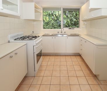Perfectly Positioned Two Bedroom Home Surrounded by Beautiful Gardens! - Photo 1
