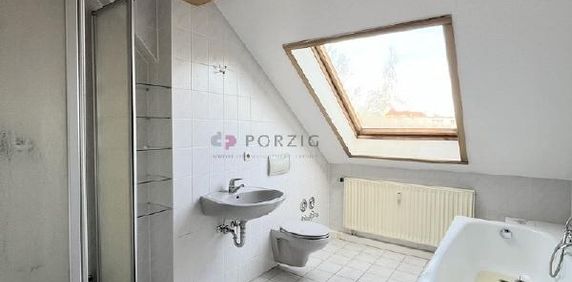 Großzügige Dachgeschosswohnung mit Tageslichtbad - Foto 2