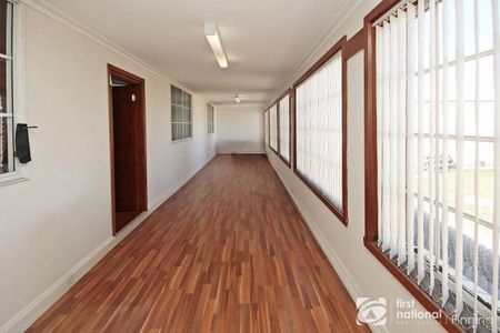 Sitting Amongst the Flowers - Photo 4