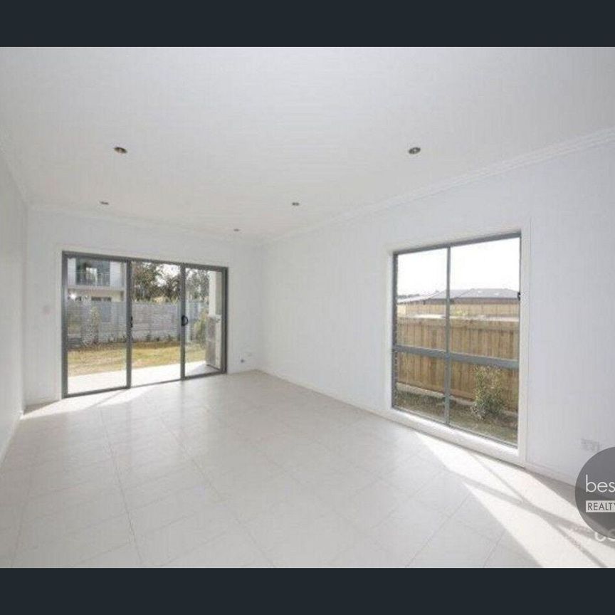 Neat and Spacious Family Home with Multiple Living Areas - Photo 1